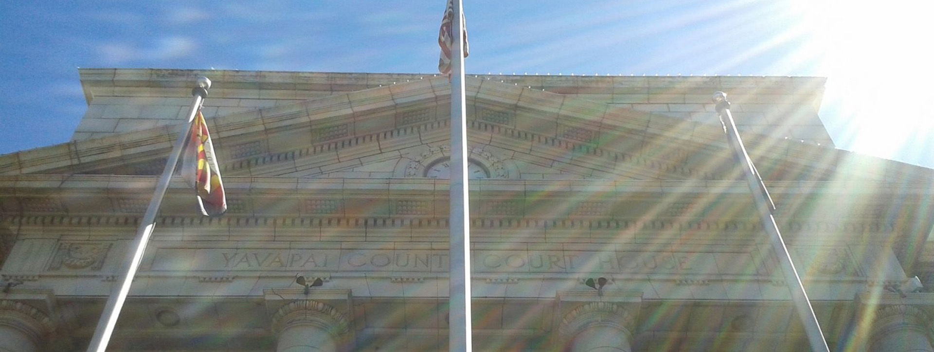 Court House building top and flags